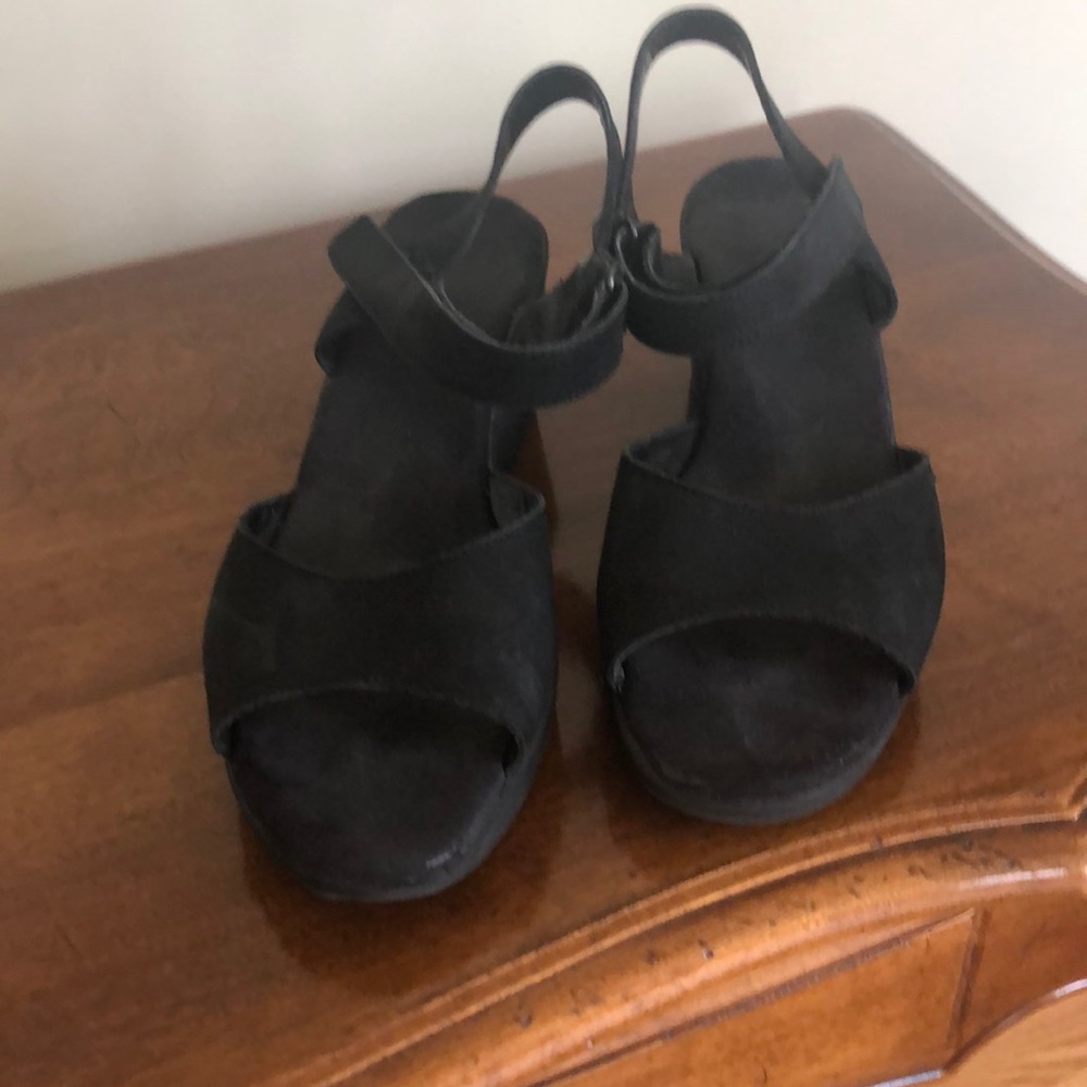 Black suede wedge sandal.